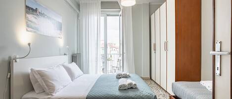 1 bedroom, desk, iron/ironing board, travel cot