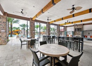 Outdoor dining - Spacious 5BR Villa with Private Pool at Solterra Resort, Minutes from Disney & Orlando (Davenport)