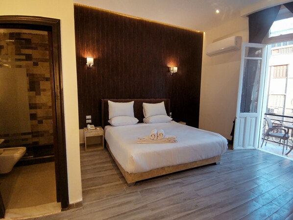 Chambre Double Deluxe | Draps en coton égyptien, literie de qualité supérieure