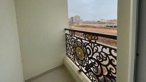 Basic Double or Twin Room, 2 Bedrooms, Accessible | Terrace/patio - almazarbuilding (Salalah)