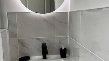 Hair dryer, towels, soap, shampoo