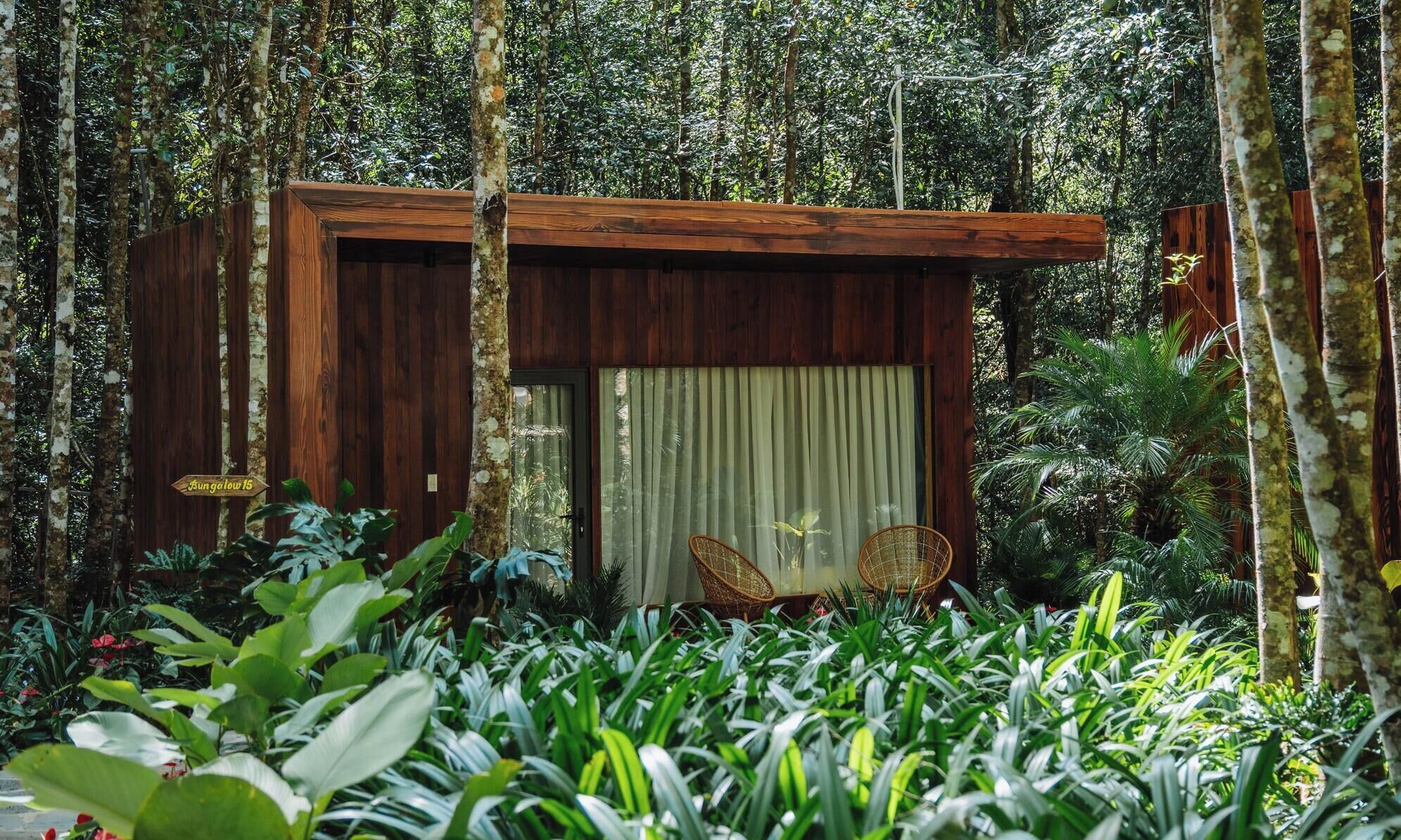 Bungalow Container With Garden View | Premium bedding, free minibar items, desk, laptop workspace