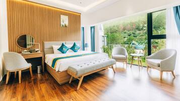 Premium bedding, free minibar items, desk, laptop workspace
