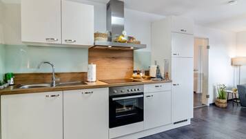 Réfrigérateur, four, plaque de cuisson, lave-vaisselle