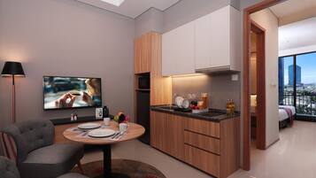 A modern kitchen with wooden cabinets, a dining area with a round table, and a TV displaying a scene.