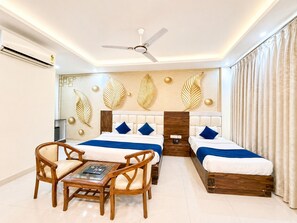 Family Room, Balcony | Minibar, individually furnished, laptop workspace, soundproofing - Dwelling residency (Greater Noida)