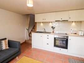 Fridge, electric kettle, cookware/dishes/utensils