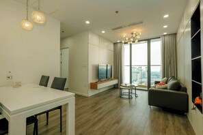 Executive Apartment, 3 Bedrooms | Living area | 50-inch Smart TV with digital channels, TV - NanaHousing-Apartment Vinhomes Skylake (Hanoi)
