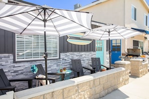 Lower patio with comfortable seating.