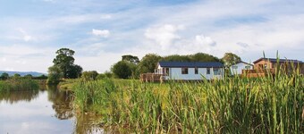 Stylish luxury lodge with meadow view.