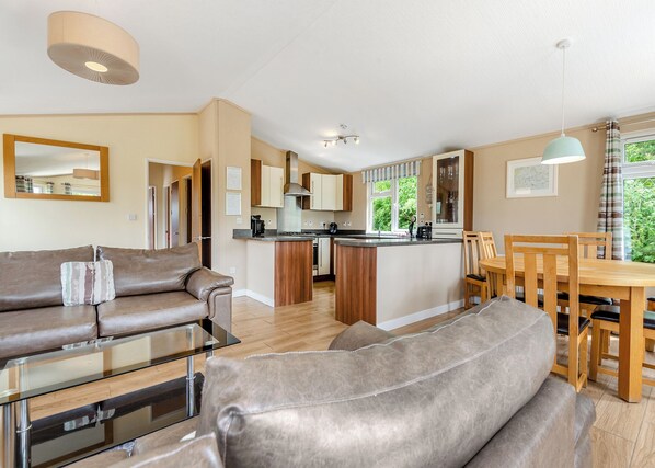 Living area - Stylish luxury lodge with meadow view. (Wattleborough, Nr Shrewsbury)