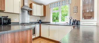 Stylish luxury lodge with meadow view.