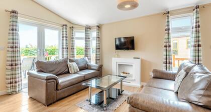 Stylish luxury lodge with meadow view.