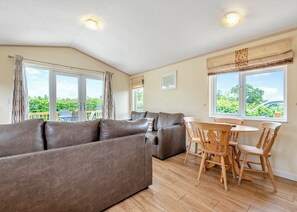Living area - Stylish luxury lodge with hill view. (Wattleborough, Nr Shrewsbury)
