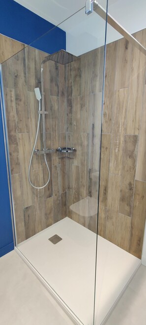 Shower, eco-friendly toiletries, hair dryer, towels