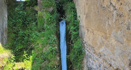 Maison autonome avec terrasse privative dans une ferme-moulin