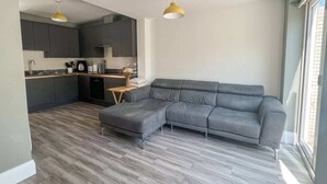Basic Apartment, Multiple Beds | Living area | TV - Lovely 2BD Flat With Private Garden - Bounds Green (London)