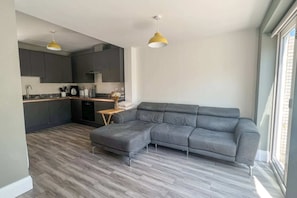Basic Apartment, Multiple Beds | Living area