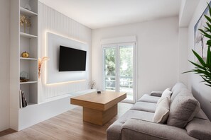 디자인 아  파트 | 거실 공간 | 위성 채널 시청이 가능한 50인치 스마트 TV, TV, 넷플릭스