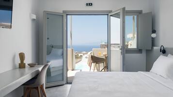 Junior Suite | 1 bedroom, premium bedding, minibar, in-room safe