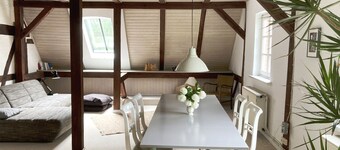 Stylish and bright apartment in a listed half-timbered house with a large garden
