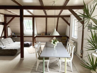 Stylish and bright apartment in a listed half-timbered house with a large garden