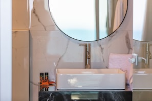Hair dryer, towels, soap, shampoo