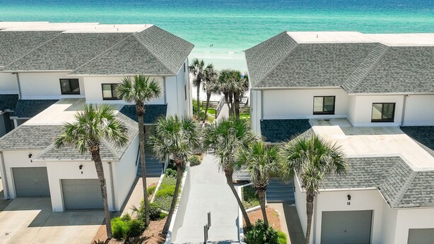 A residential area with two-story houses, a central pathway, and a view of the ocean. - Private Beach|Bikes|Pool|Next2Seaside (Santa Rosa Beach)