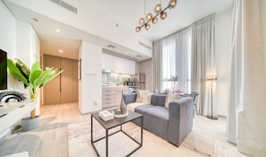 TV - Polished Studio at Mesk 1 Midtown Dubai Production City by Deluxe Holiday Homes (Dubai)