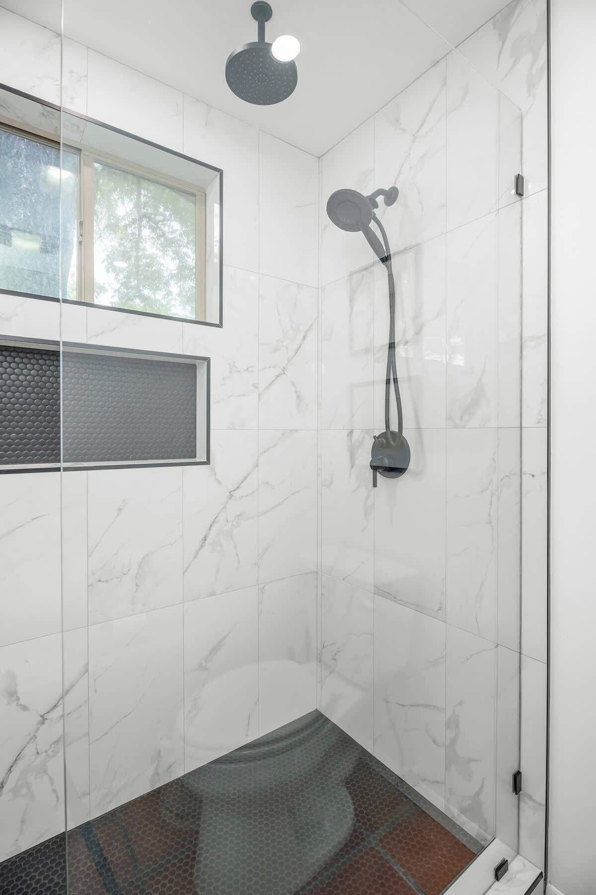 Shower, hair dryer, towels, shampoo