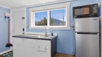 Fridge, microwave, coffee/tea maker, toaster