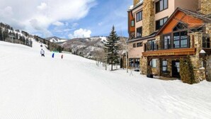 A ski resort with a building labeled "MICHAELS SLOPESIDE".