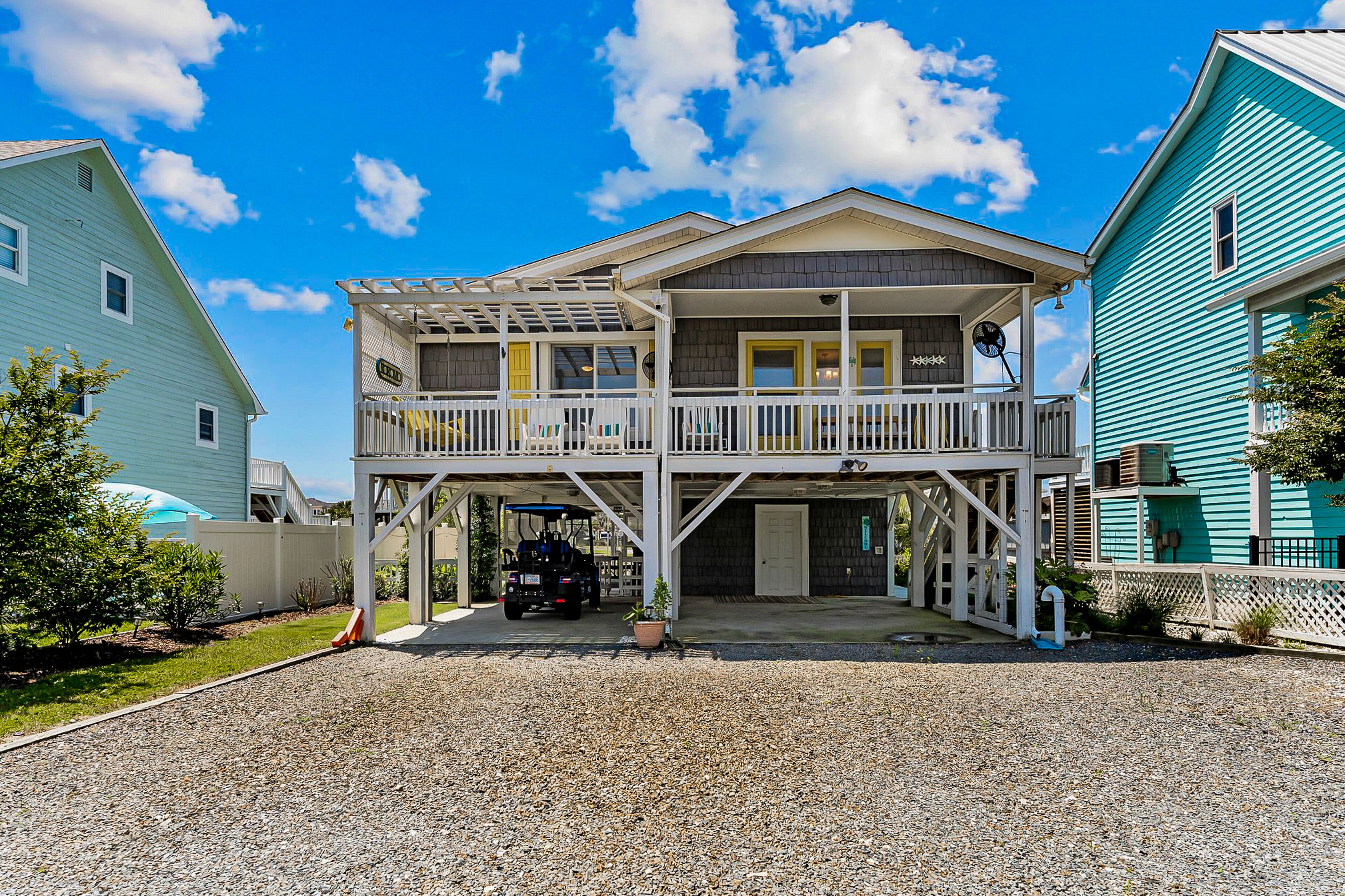 Waterfront home with Intracoastal views, outdoor areas, dock, & golf cart access