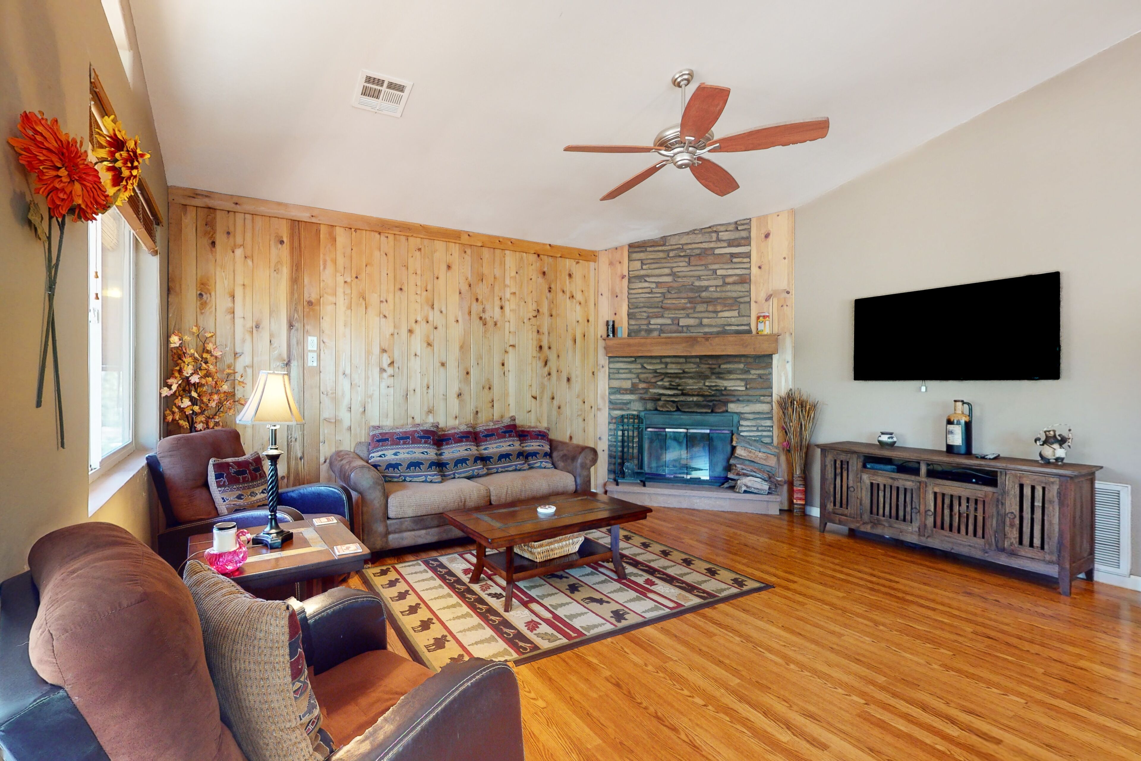 Dog-friendly tree-lined retreat with wood-burning fireplace, grill, W/D, & AC