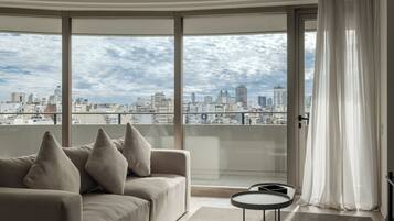 Deluxe Apartment | Living area | TV
