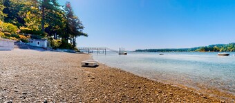 Sound view retreat with trails, beach access, firepit, grill, scenic deck, & W/D