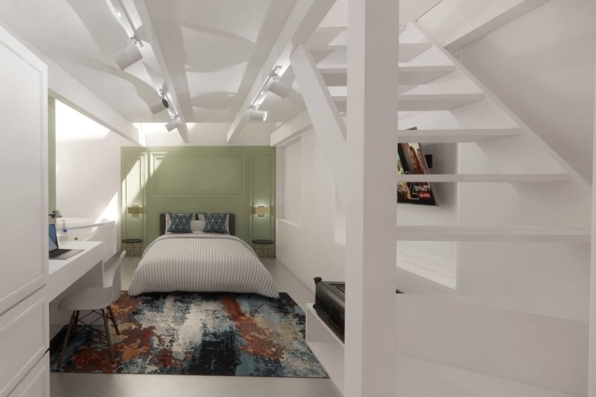 A modern bedroom with a bed, a desk, and a bookshelf.