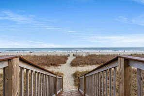 On the beach, sun loungers, beach towels
