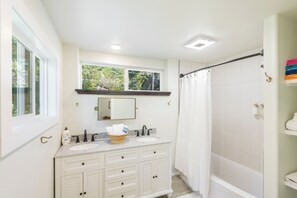 Hair dryer, towels, soap, shampoo