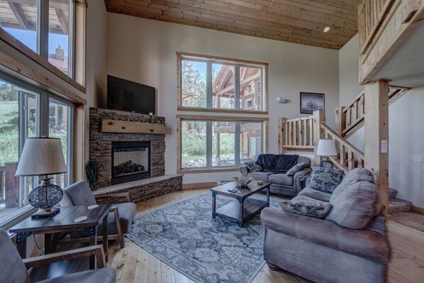 Luxury Chalet, 3 Bedrooms, Mountain View | Living room | 42-inch TV with cable channels, fireplace