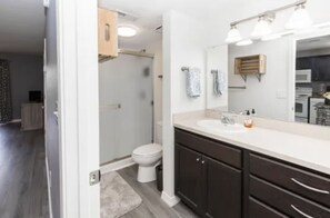 Shower, hair dryer, towels, soap
