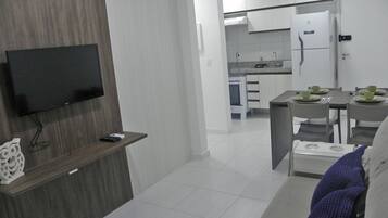 Family Apartment | Living area | 40-inch TV with digital channels
