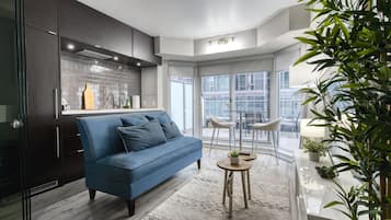 Luxury Condo | Private kitchen | Full-size fridge, microwave, oven, stovetop