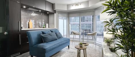 Luxury Condo | Private kitchen | Full-sized fridge, microwave, oven, stovetop