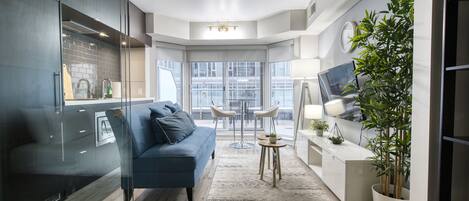 Luxury Condo | Living area | 55-inch Smart TV with digital channels, TV, fireplace