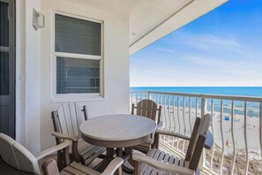 Outdoor dining - Emerald Key 603: Beachfront Balcony, 6th floor, corner unit! (Orange Beach)