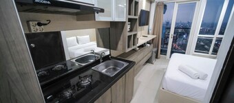 Homey Studio At Tamansari Papilio Apartment