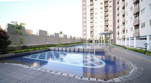 Outdoor pool - Best Choice And Homey 2Br At Puncak Dharmahusada Apartment (Surabaya)