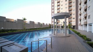 Outdoor pool - Best Choice And Homey 2Br At Puncak Dharmahusada Apartment (Surabaya)