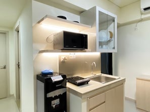 Appartement Deluxe | Cuisine privée | Grand réfrigérateur, micro-ondes, plaque de cuisson, cuiseur de riz